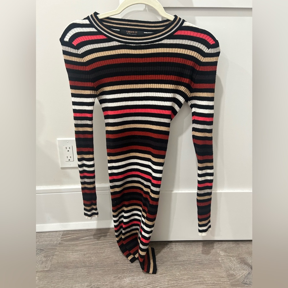 Long sleeve, multicolored, striped fitted dress.